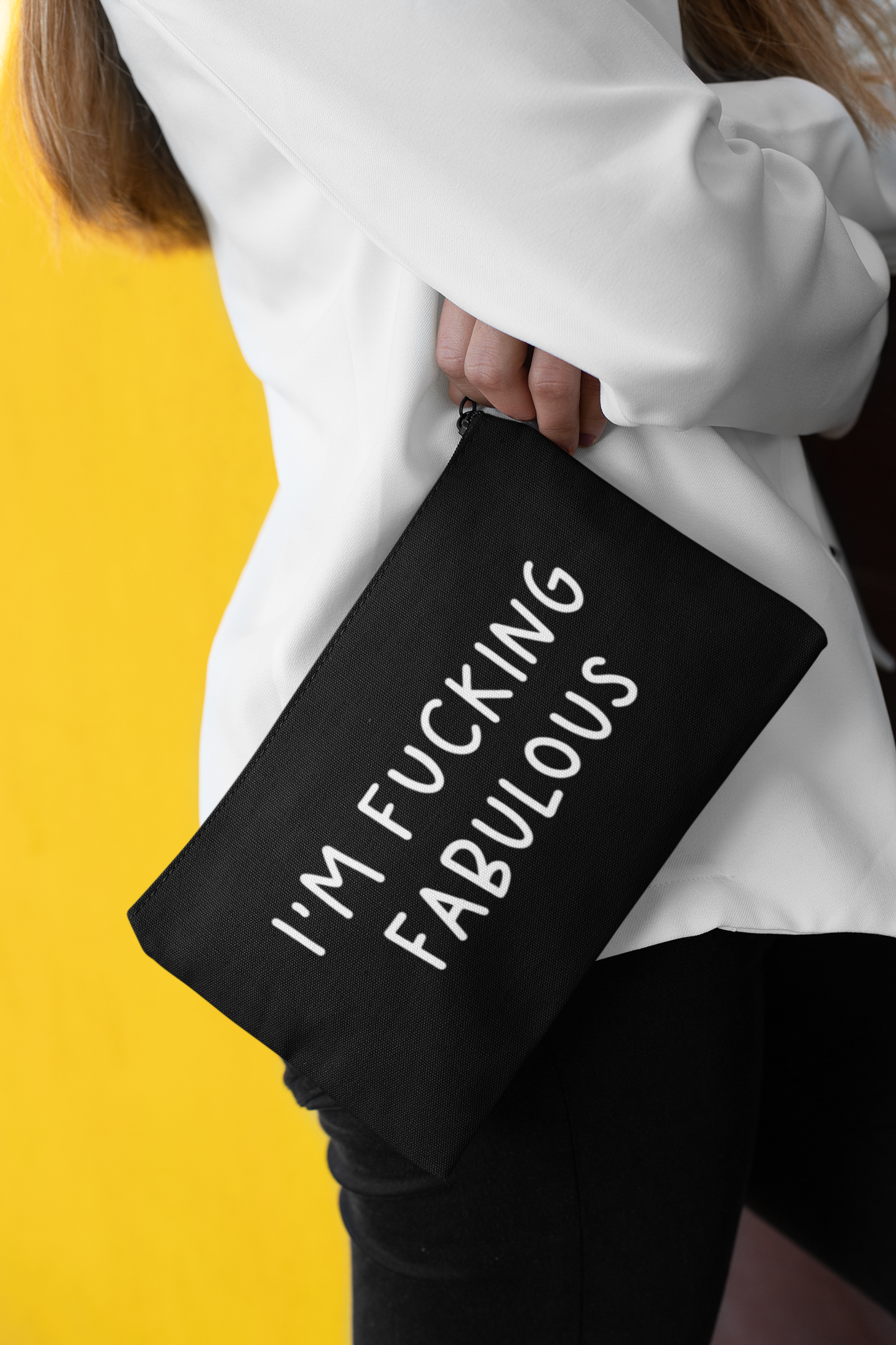 Black make up bag with the quote 'i'm fucking fabulous' to the front in white text