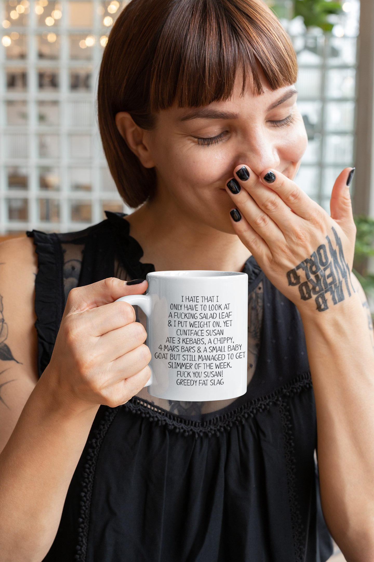 Very funny white ceramic mug with a quote printed to the front I hate that I only have to look at a fucking salad leaf and put weight on followed by more profanity references about weight gain and diet clubs.